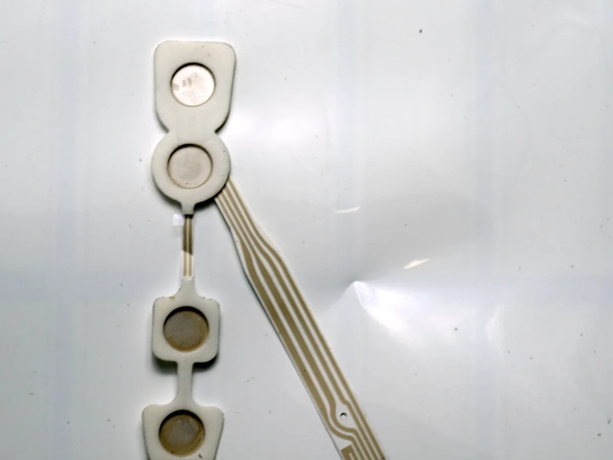 rear contact-window construction of a flexible printed electrode array