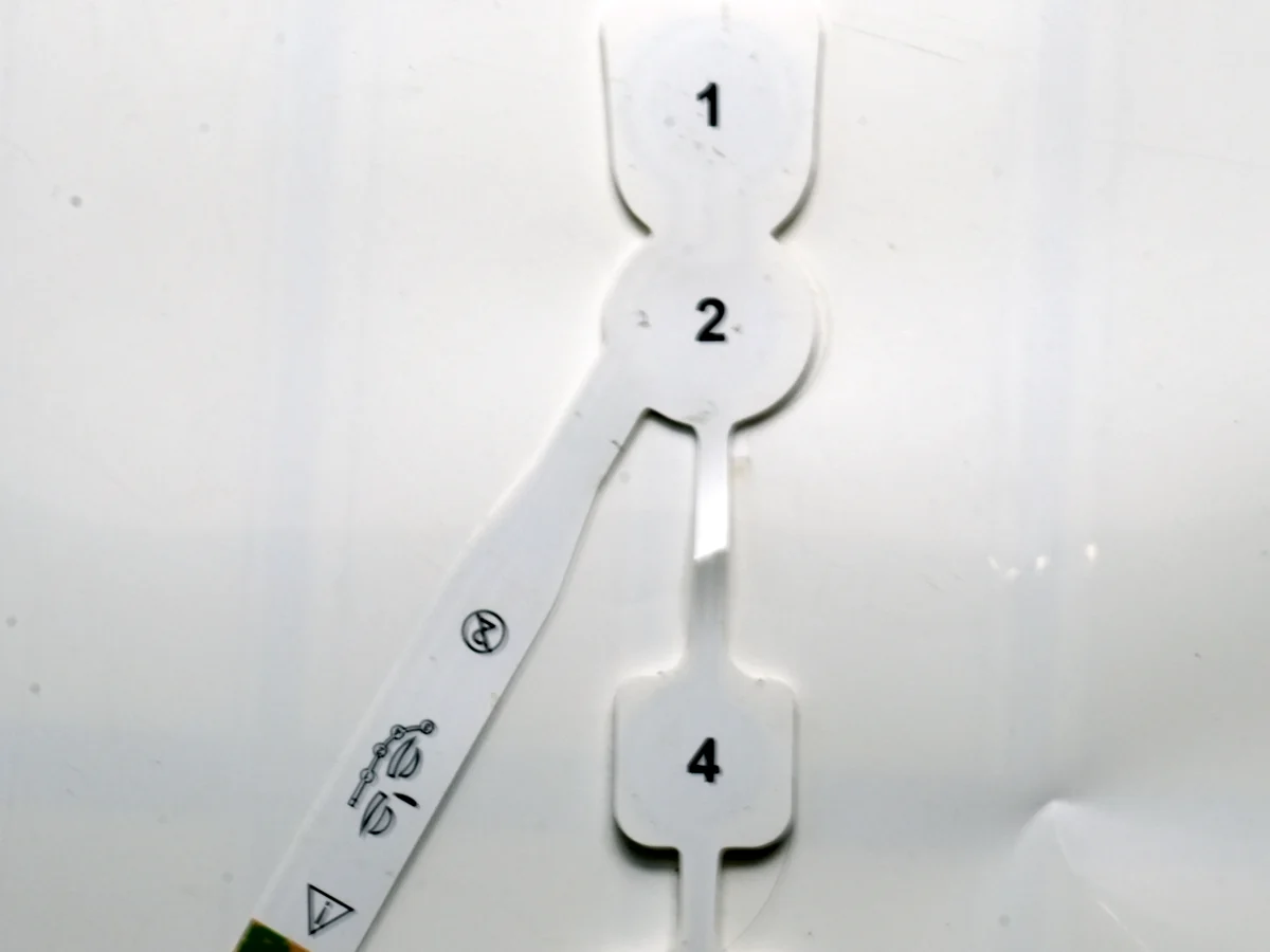 rear view of a flexible wearable electrode patch and circuit tail