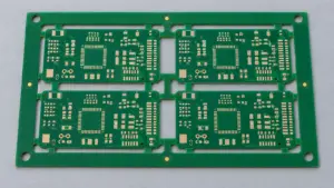 Four-board PCB panel with outer rails, routed openings and tooling holes